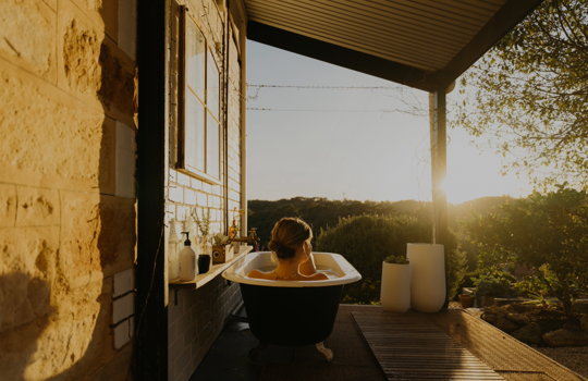 Woman in an outdoor bath